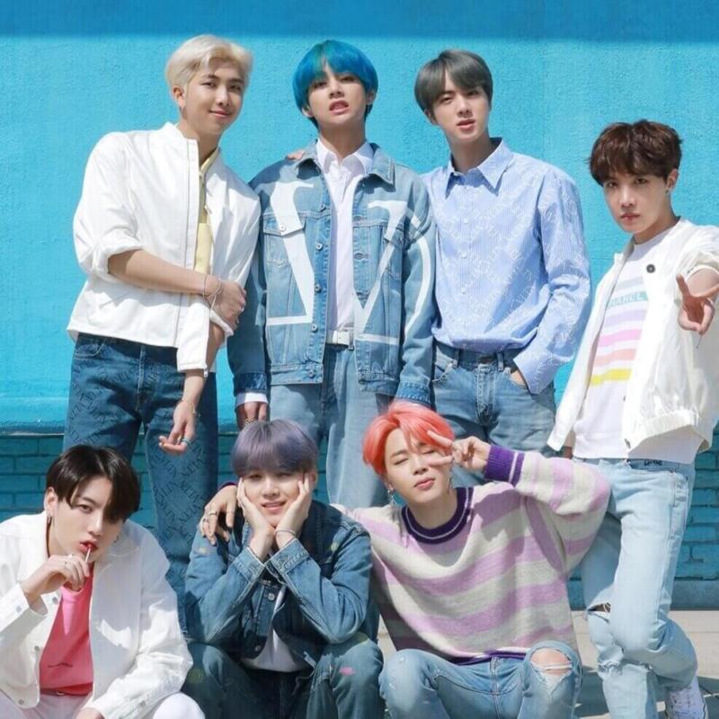 BTS, commonly known as the Bangtan Boys, debuted in 2013 under Big Hit Entertainment. The septet—Jin, Suga, J-Hope, RM, Jimin, V, and Jungkook—co-writes and co-produces much of their own work. Originally a hip hop trio, their style has developed to include a wide range of genres; their lyrics often tackle mental health, school-age youth, coming of age, loss, self-love, and individualism. Their work references literature, philosophy, and psychology and has an alternate universe plot.