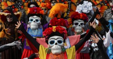 Day of the Dead is celebrated on November 1 and 2, but other days, such as October 31 or November 6, may be included. It's widely observed in Mexico, where it originated, and elsewhere, especially by Mexicans. Even though it is related to the Christian celebrations of Hallowtide, it has a much less sad tone and is seen as a happy holiday rather than a time of mourning. Family and friends gather for the multi-day holiday to remember the dead. These celebrations can be humorous as people recall funny memories of the deceased.